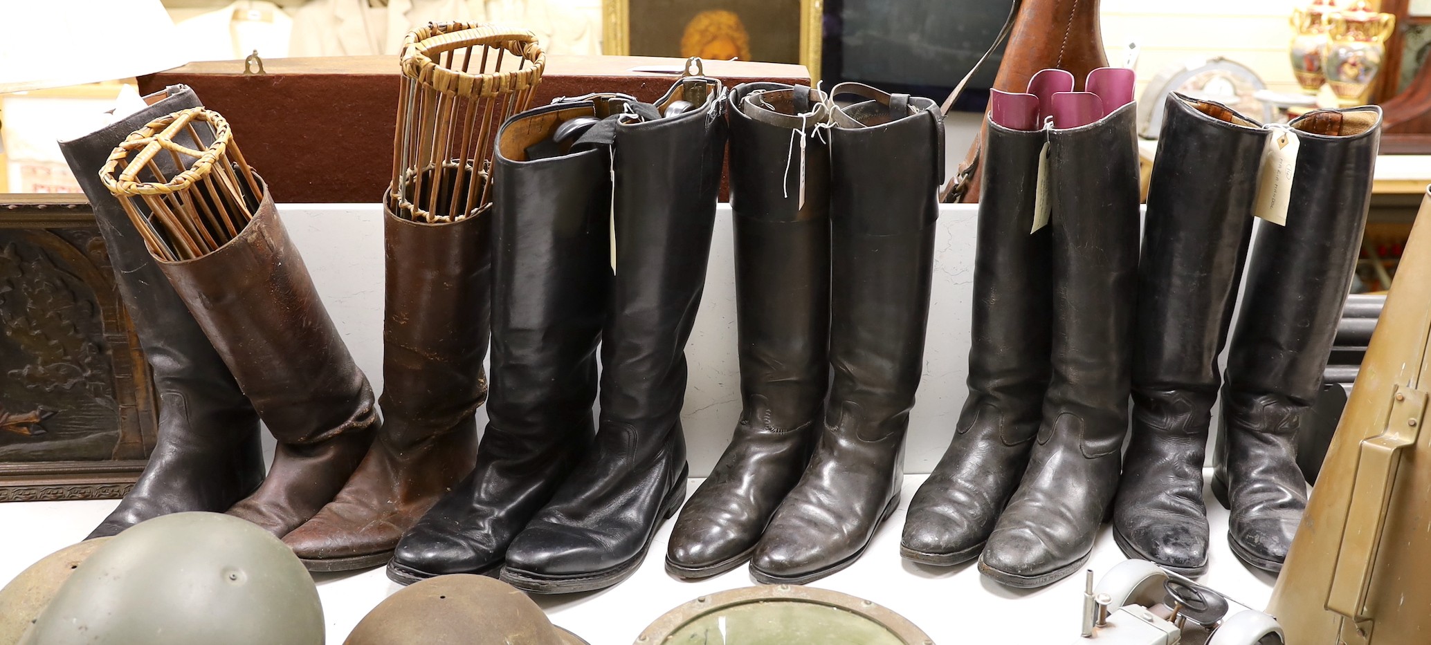 Five pairs of leather Wellington boots, soles vary around 30cm